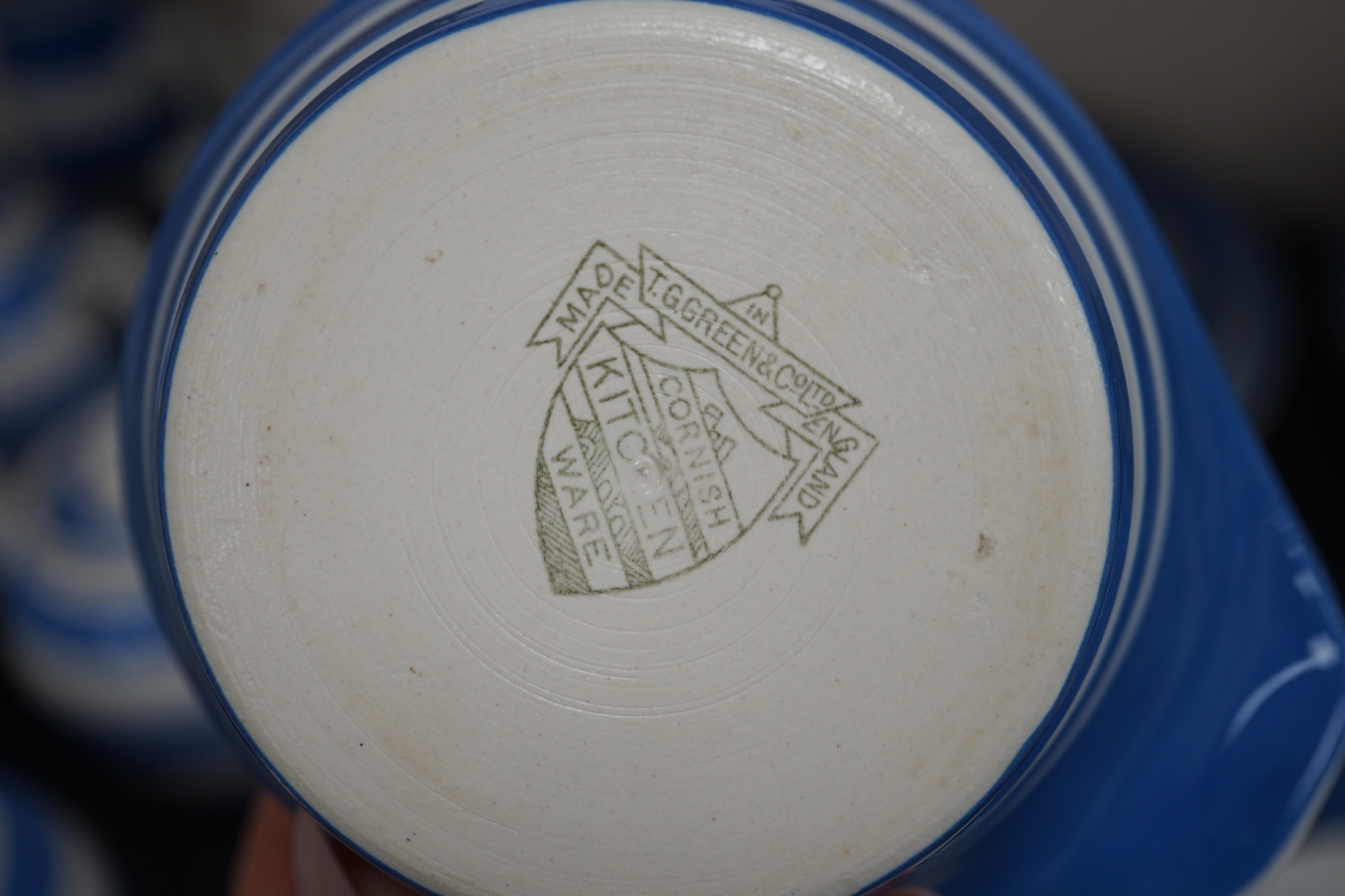 T.G.Green Cornish Kitchenware, a collection of assorted tableware to include eight teapots, four muffin dishes, lidded salt jar and cream jugs, approximately fifty pieces, mainly Green Shield marks. Condition - fair to g